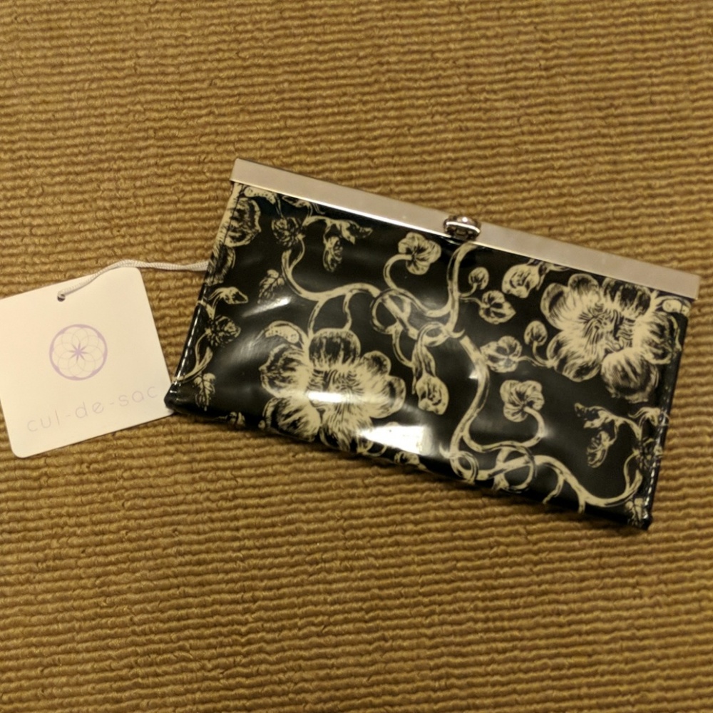 Black and tan floral wallet